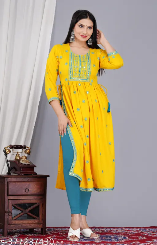 Fashionable Women&amp;amp;amp;#039;s Embroidered with Mirar Work Round Neck Rayon yellow naira cut Kurta For Women