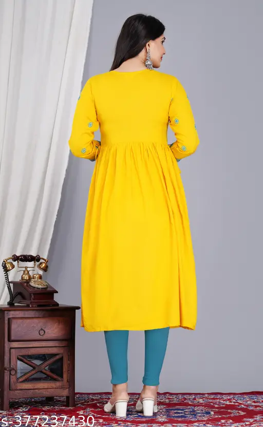 Fashionable Women&amp;amp;amp;#039;s Embroidered with Mirar Work Round Neck Rayon yellow naira cut Kurta For Women