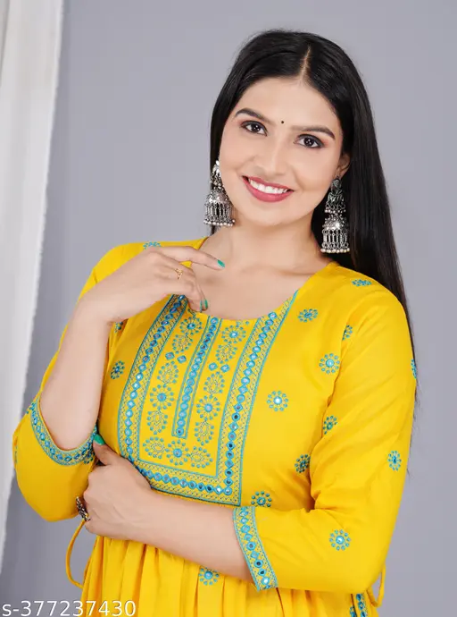 Fashionable Women&amp;amp;amp;#039;s Embroidered with Mirar Work Round Neck Rayon yellow naira cut Kurta For Women